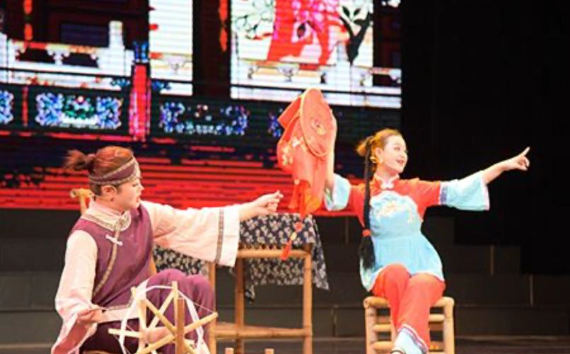 Traditional Northern Guangdong Tea-Picking Opera performers in colorful costumes (粤北采茶戏传统表演)